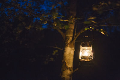 Close-up of illuminated lantern at night