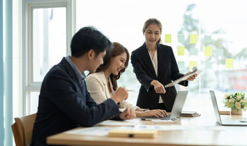 Business colleagues working at office