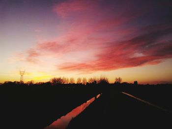 Empty road at sunset