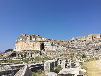 Old ruins against clear blue sky