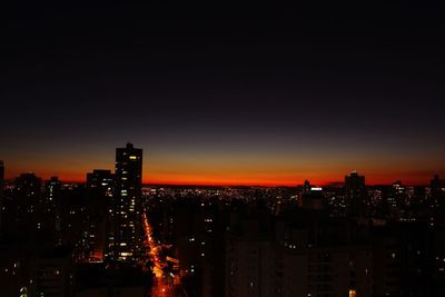 Illuminated cityscape at night