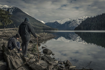 Scenic view of lake against cloudy sky