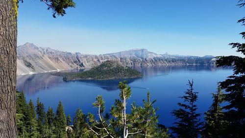 Scenic view of lake against blue sky