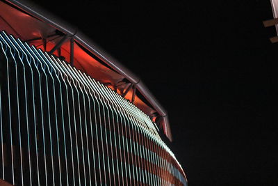 Low angle view of illuminated building at night