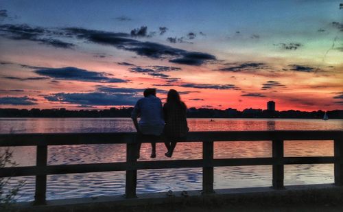 Silhouette of people at sunset