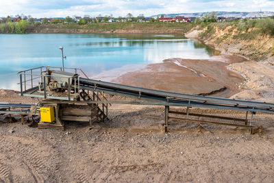 A string of transport belting in a gravel pit for transporting gravel and sand over long distances