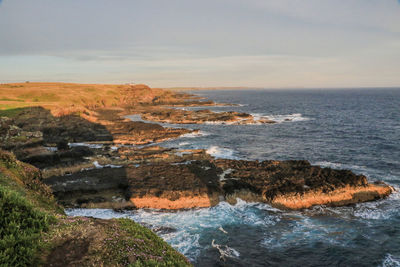 The coast of phillip island at sunset