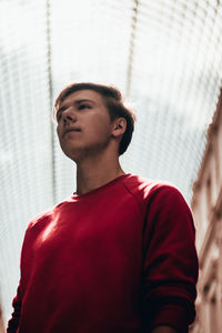 Portrait of young man looking away