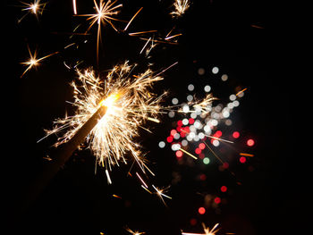 Firework display at night