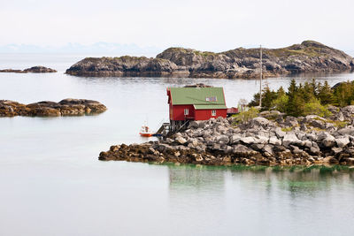 Sea archipelago with a house on a island