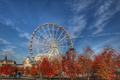 Ferris wheel against blue sky