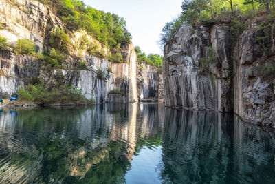 Small lake in pocheon art valley. an old granite quarry turned into park with famous granite cliffs.