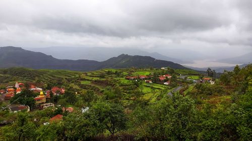 Scenic view of townscape against sky