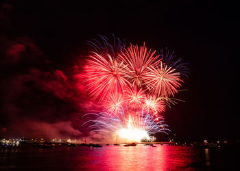 Firework display at night