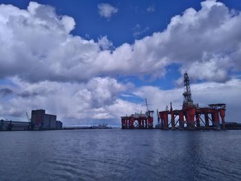 Pier over sea against sky