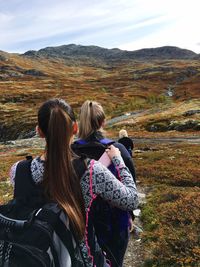 Rear view of women on mountain