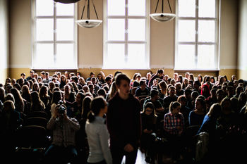 GROUP OF PEOPLE AT MUSIC