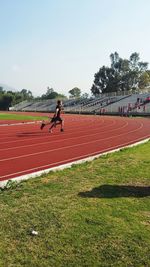 People running on field