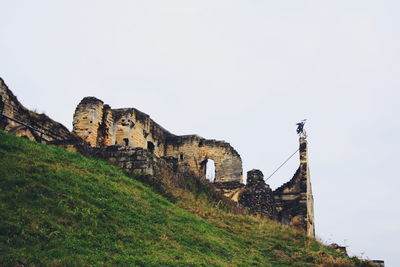 Low angle view of old building against clear sky