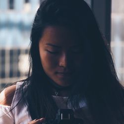 Close-up of a serious young woman