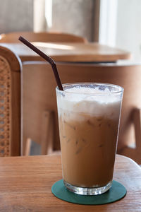 Close-up of coffee cup on table