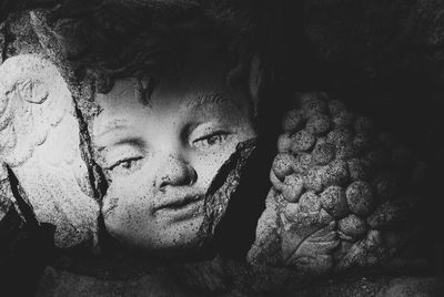 Close-up portrait of young man with eyes closed