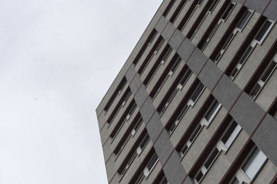 Low angle view of modern building against clear sky