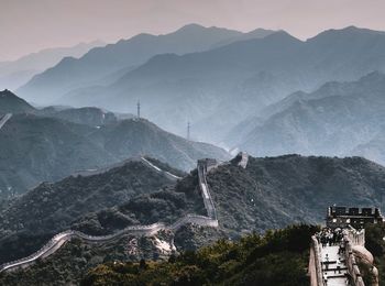 Aerial view of buildings against mountain range