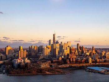High angle view of city at sunset