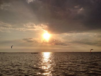 Scenic view of sea against cloudy sky