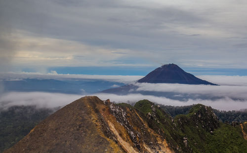 Panoramic view of volcanic landscape against sky