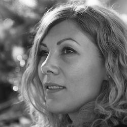 Close-up portrait of woman looking away