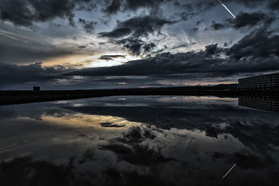 Scenic view of dramatic sky during sunset