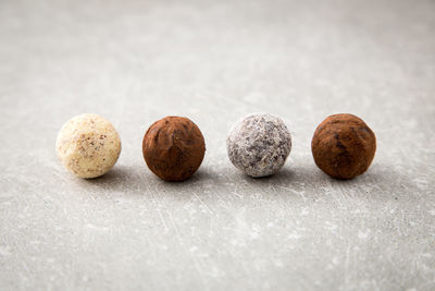 Close-up of pebbles on table