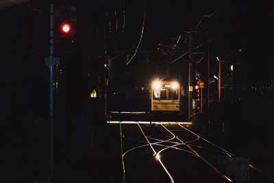 Train against sky at night