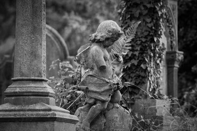 Statue of angel in cemetery