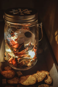 Close-up of illuminated jar