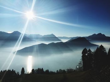 Scenic view of silhouette mountains against sky