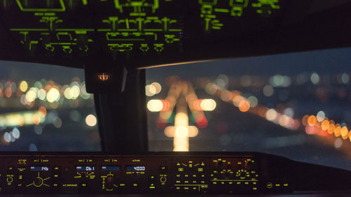 Cockpit of commercial airplane at night