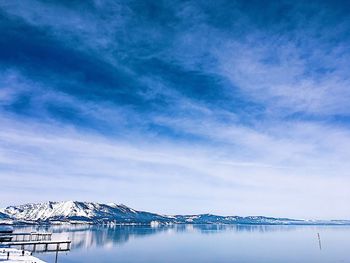 Scenic view of sea against blue sky