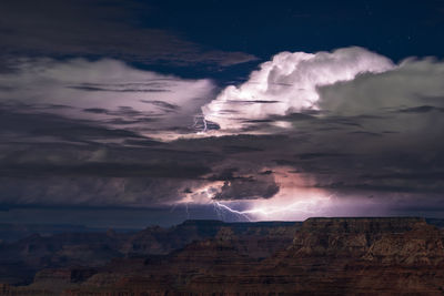 Lightning illuminates a summer thunderstorm over the grand canyon