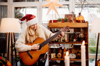 Woman playing guitar