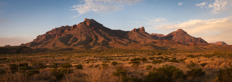 Panoramic view of rock formations on field against sky in big bend national park - texas