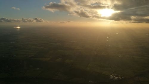 Scenic view of landscape against sky during sunset