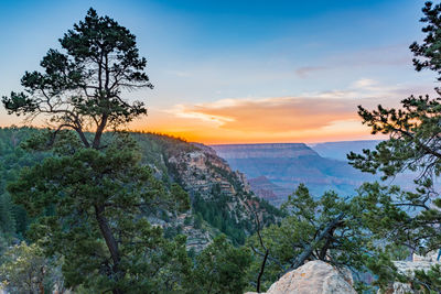 Scenic view of landscape against sky during sunset