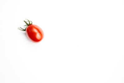 Close-up of cherry tomatoes against white background