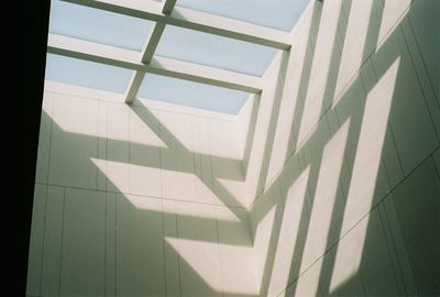 Low angle view of shadow on wall