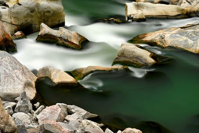 High angle view of rocks in lake