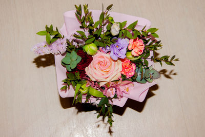 Directly above shot of pink roses on table