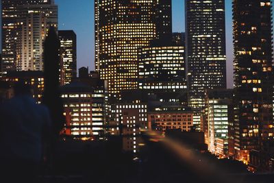 Illuminated cityscape at night